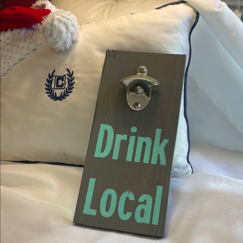 Gray Wall-Mounted Bottle Opener with Teal Text